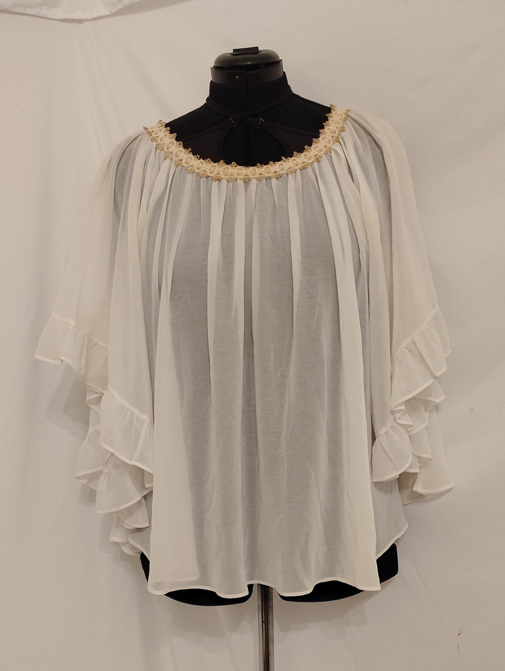 Cream Off-Shoulder Ruffle Blouse with Decorative Trim
